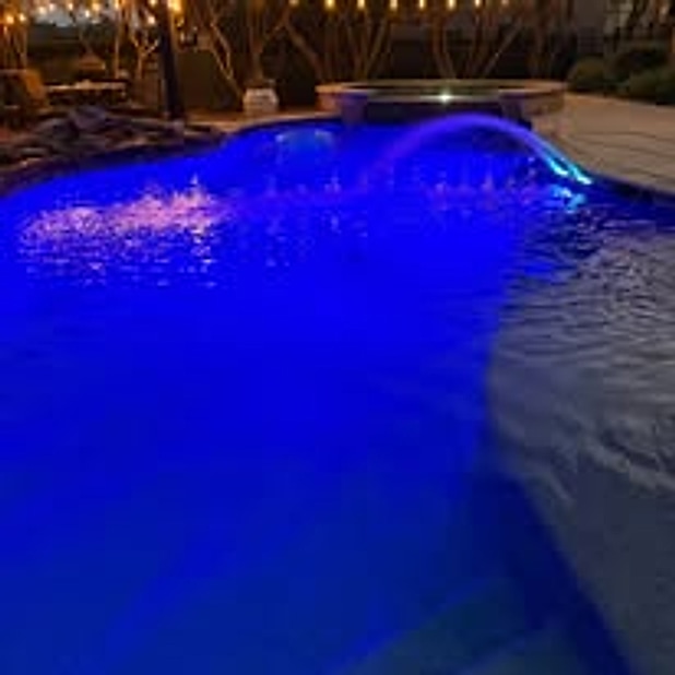 Pool with beautiful blue nighttime lighting